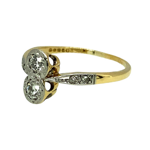 Preowned 18ct Yellow Gold & Platinum Diamond Double Solitaire Ring with vintage old cut Diamonds which are approximately 10pt each making a total of 20pt set in the Platinum. The Diamonds are approximately clarity VS - Si and colour H - J. The ring is in size M with the weight 2.20 grams