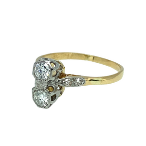 Preowned 18ct Yellow Gold & Platinum Antique Diamond Double Solitaire Ring in size M with the weight 2.10 grams. There is approximately 14pt - 15pt in each Diamond so 28pt - 20pt of Diamonds in total. The Diamonds are approximately colour i - K and clarity Si2