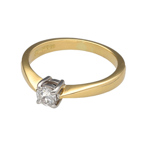 Preowned 18ct Yellow and White Gold & Diamond Set Solitaire Ring in size J with the weight 3.20 grams. The Diamond is four claw set and is approximately 25pt in brilliant cut. The Diamond has the approximate clarity VS1 and colour J - K