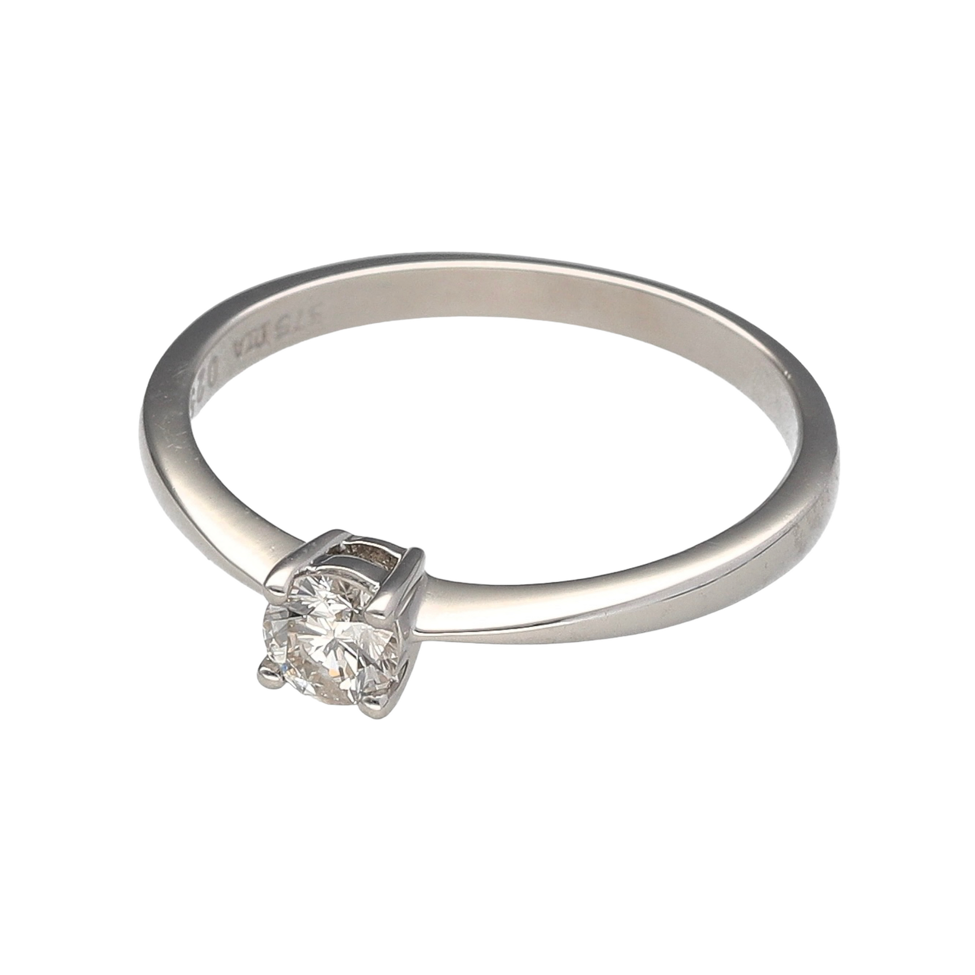 Preowned 9ct White Gold & 25pt Diamond Set Solitaire Ring in size M with the weight 1.50 grams. The Diamond is brilliant cut and is approximately 25pt. The Diamond is also four claw set and is approximate clarity Si1 and colour M - O