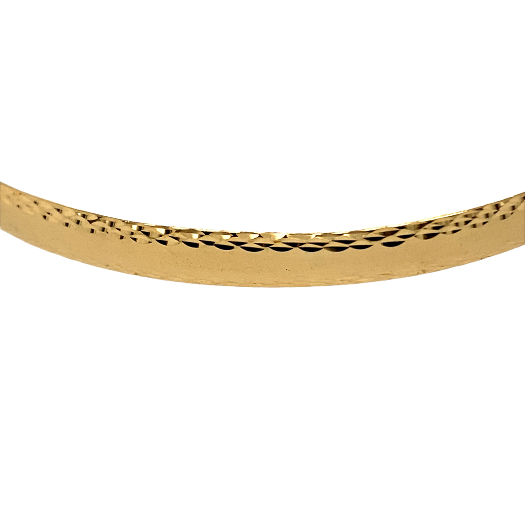 New 9ct Yellow Solid Gold Patterned Bangle with the weight 8 grams and diameter 6.8cm. The bangle band is 5mm wide and has a mill grain style pattern on the sides of the bangle