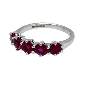 Preowned 18ct White Gold & Ruby Set Five Stone Band Ring in size K with the weight 3.20 grams. The ruby stones are each 4mm diameter