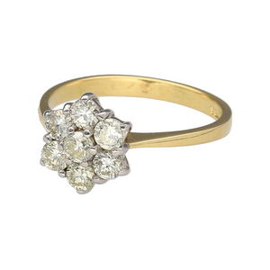 Preowned 18ct Yellow and White Gold & Diamond Set Cluster Flower Ring in size L with the weight 2.90 grams. There is approximately 75pt of Diamond content with approximate clarity Si and colour M - O