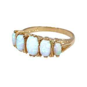 New 9ct Yellow Gold & Created Opal Five Stone Ring in various sizes with the weight 3.50 grams. The center stone is 7mm by 5mm and they go out in graduating size