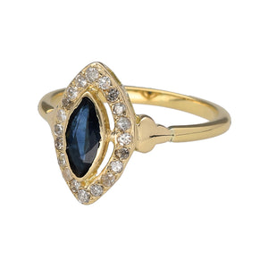 Preowned 18ct Yellow Gold Diamond & Sapphire Set Antique Style Ring in size M with the weight 3.20 grams. The sapphire stone is rubover set and is marquise size surrounded by Diamonds. The sapphire stone is 8mm by 4mm