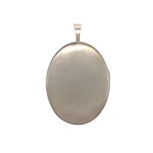 A New Silver Oval Locket with a Diamond Cut Pattern with the weight 4.30 grams. The locket is 3.2cm long including the bail by 2.1cm