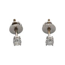 Load image into Gallery viewer, New 18ct White Gold 0.15pt Diamond Stud Earrings with the weight 0.90 grams. There is 30pt in total in the earrings with 15pt on each stud. The Diamond are approximately Si1 and colour I -J. The earrings have screw backs for extra safety and each stud is approximately 15mm long

