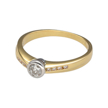 Load image into Gallery viewer, Preowned 18ct Yellow and White Gold &amp; Diamond Set Solitaire Ring in size K with the weight 2.90 grams. The ring has Diamond set shoulders and there is approximately 25pt of Diamonds in total set in the ring. The Diamonds are approximate clarity Si2 and colour I - K
