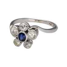 Load image into Gallery viewer, Preowned 18ct White Gold &amp; Platinum Diamond &amp; Sapphire Set Flower Ring in size N with the weight 3.50 grams. The Diamond are in a rubover setting in a beautiful unique Diamond &amp; Sapphire flower dress ring. There are five old cut Diamonds ranging from approximately 5pt - 11pt - 25pt each as there are all slightly different sizes. 
