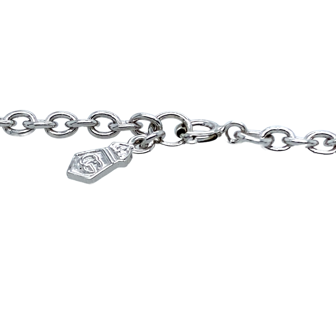 Preowned 925 Silver with 9ct Rose Gold Clogau Royal Oak 7.5" Bracelet set with three 1.5mm diameter Peridot stones. The bracelet has the weight 8.3mm and link width 2mm. The charms are between 6mm and 10mm long