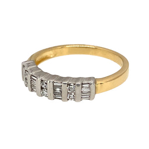 Preowned 18ct Yellow and White Gold & Diamond Set Band Ring in size N with the weight 3.20 grams. The ring is made up of brilliant and baguette cut Diamond at approximately 25pt of Diamond content in total. The band is 4mm wide at the front