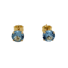 Load image into Gallery viewer, New 9ct Yellow Gold March Birthstone Stud Earrings with the weight 0.50 grams. The earrings are set with a synthetic aquamarine stone which is 5mm diameter
