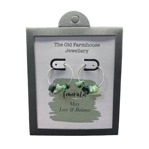 New 925 Silver & Emerald Set May Birthstone Hoop Earrings with the approximate weight 2 grams. The earrings contain approximately six gemstone each and the diameter of the hoops are each 2cm. Emerald is the birthstone for the month of May and is said to bring love and balance to the wearer