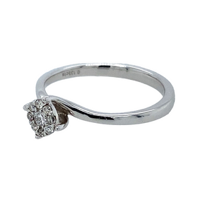 Preowned 9ct White Gold & 0.135pts Diamond Cluster Solitaire Look Ring in size M with the weight 2.20 grams