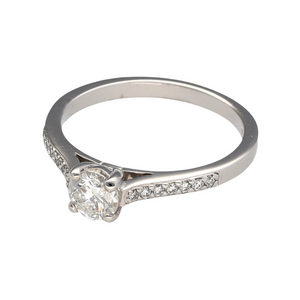 New 18ct White Gold & Diamond Solitaire Ring with Diamond set shoulders. There is approximately 64pt of Diamonds in total with approximate colour G/H and clarity Si2. This ring is in size N with the weight 3.30 grams